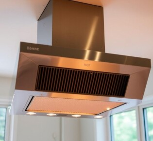 Когда вытяжка не кричит: как выбрать тихую модель для кухни и почему это важно